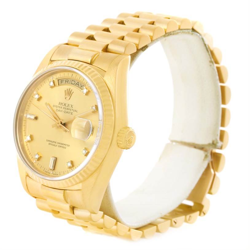 This Rolex President 18038 Men
s Yellow Gold Champagne Dial 18038 Men
s Yellow Gold Champagne Dial model watch is shown from a left side angle, displaying the face, crown, and bracelet.