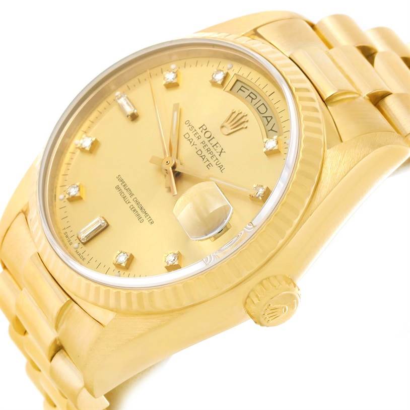 This Rolex President 18038 Men
s Yellow Gold Champagne Dial 18038 Men
s Yellow Gold Champagne Dial model watch is shown at an angle displaying the dial, crown, and part of the bracelet.