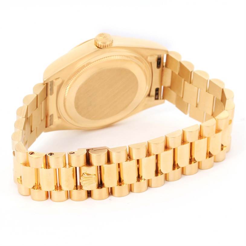This image shows the back case and bracelet of a Rolex President 18038 Men
s Yellow Gold Champagne Dial 18038 Men
s Yellow Gold Champagne Dial model watch from a rear angle.