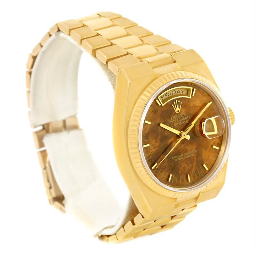 The image shows a Rolex President 19018 Men's Yellow Gold Brown Dial 19018 Men's Yellow Gold Brown Dial watch featuring its gold strap, bezel, and face with day and date displays, viewed from a front-left angle.