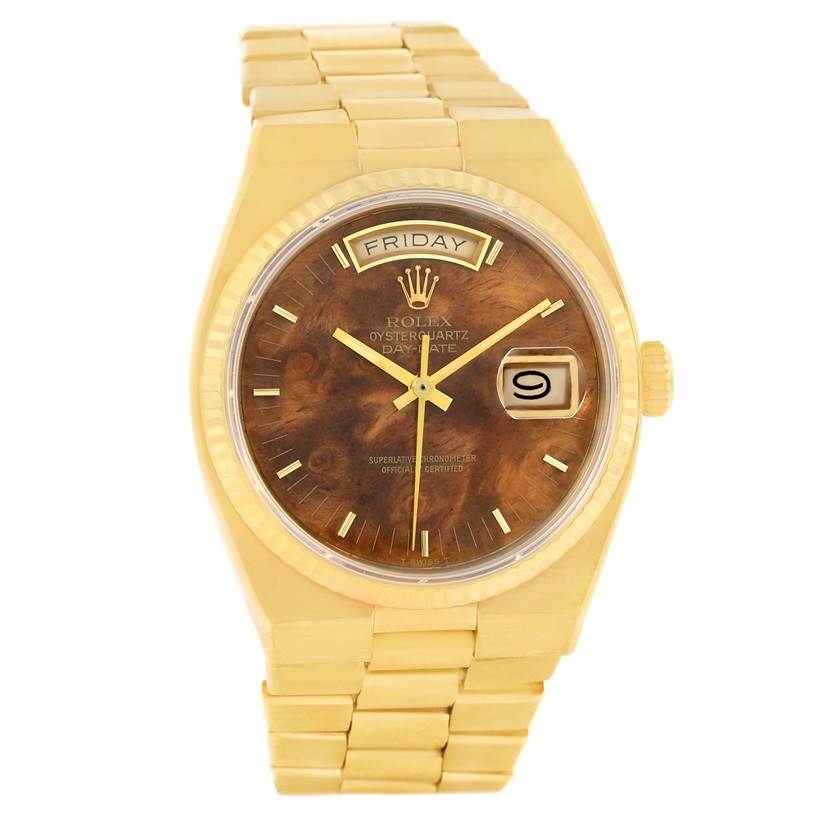 The Rolex President 19018 Men's Yellow Gold Brown Dial 19018 Men's Yellow Gold Brown Dial model watch is shown from a frontal angle, highlighting the dial, day-date display, and bracelet.