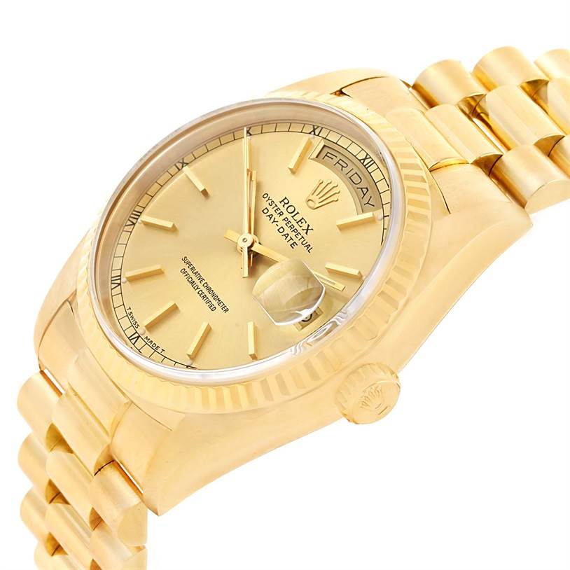 The image shows a Rolex President 18238 Men
s Yellow Gold Champagne Dial 18238 Men
s Yellow Gold Champagne Dial model viewed at an angle, highlighting the gold dial, day-date display, fluted bezel, and bracelet.