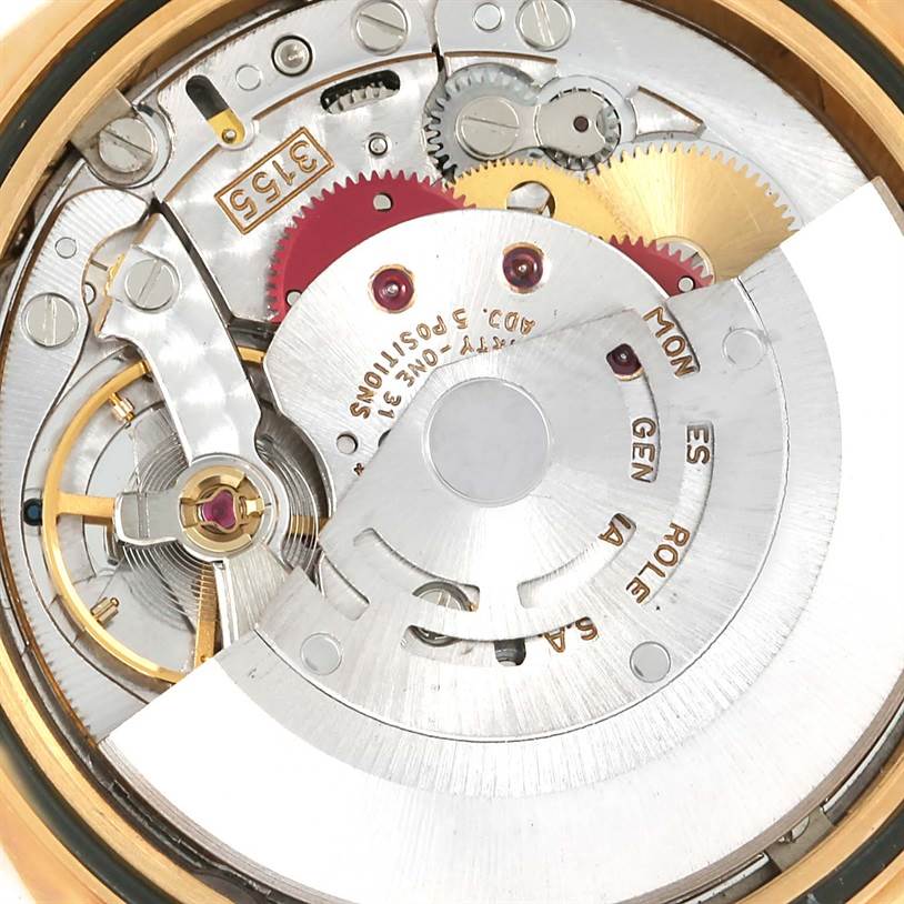 This image shows an internal view of the movement and intricate gears of a Rolex President 18238 Men
s Yellow Gold Champagne Dial 18238 Men
s Yellow Gold Champagne Dial model watch.