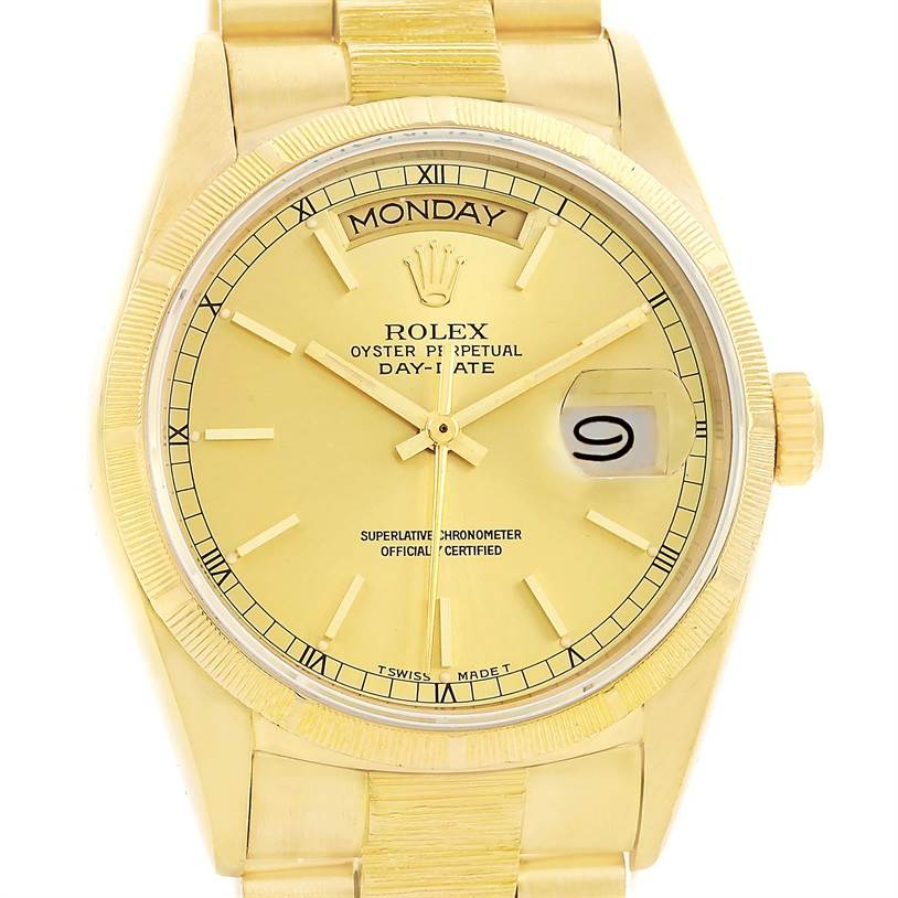 This is a full frontal view of a Rolex President 18078 Men
s Yellow Gold Champagne Dial 18078 Men
s Yellow Gold Champagne Dial Day-Date watch, showing the face, hands, day, and date indicators.