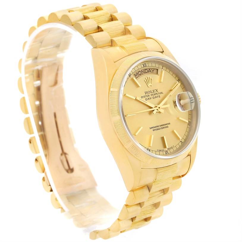 The image shows a Rolex President 18078 Men
s Yellow Gold Champagne Dial 18078 Men
s Yellow Gold Champagne Dial model watch at a three-quarter angle, displaying its gold bracelet, dial, and day-date feature.