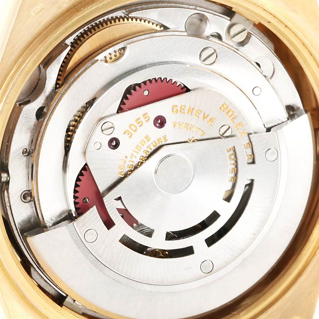 This image shows the inner mechanical movement of the Rolex President 18038 Men
s Yellow Gold Black Dial 18038 Men
s Yellow Gold Black Dial model watch from a close-up angle.