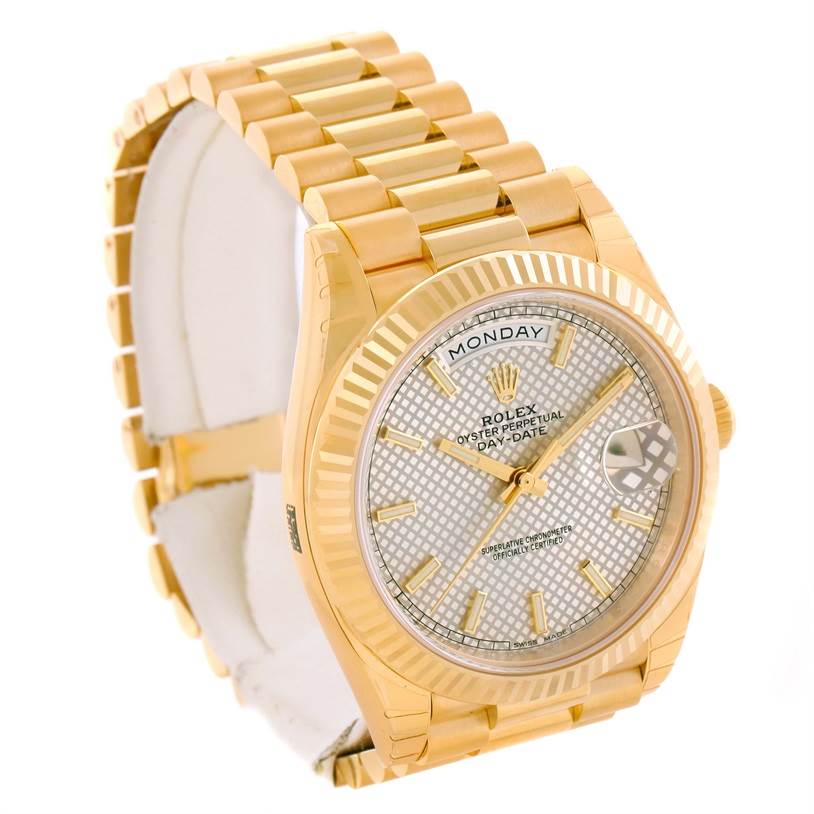 The Rolex President 228238 Men's Yellow Gold Champagne Dial 228238 Men's Yellow Gold Champagne Dial model watch is shown at a three-quarter angle highlighting its face, bracelet, and fluted bezel.