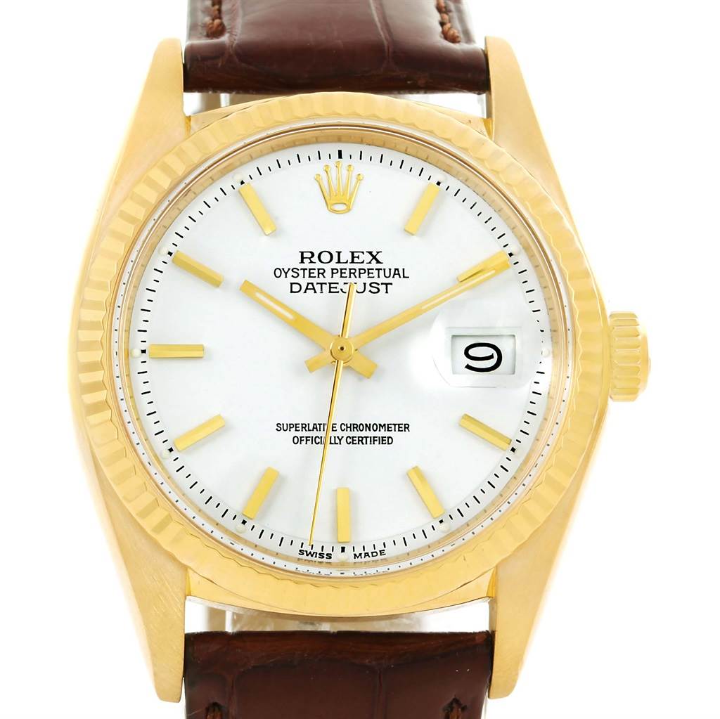 The image shows a front view of the Rolex President 1601 Men
s Yellow Gold White Dial 1601 Men
s Yellow Gold White Dial model watch, featuring its dial, hands, bezel, crown, and leather strap.
