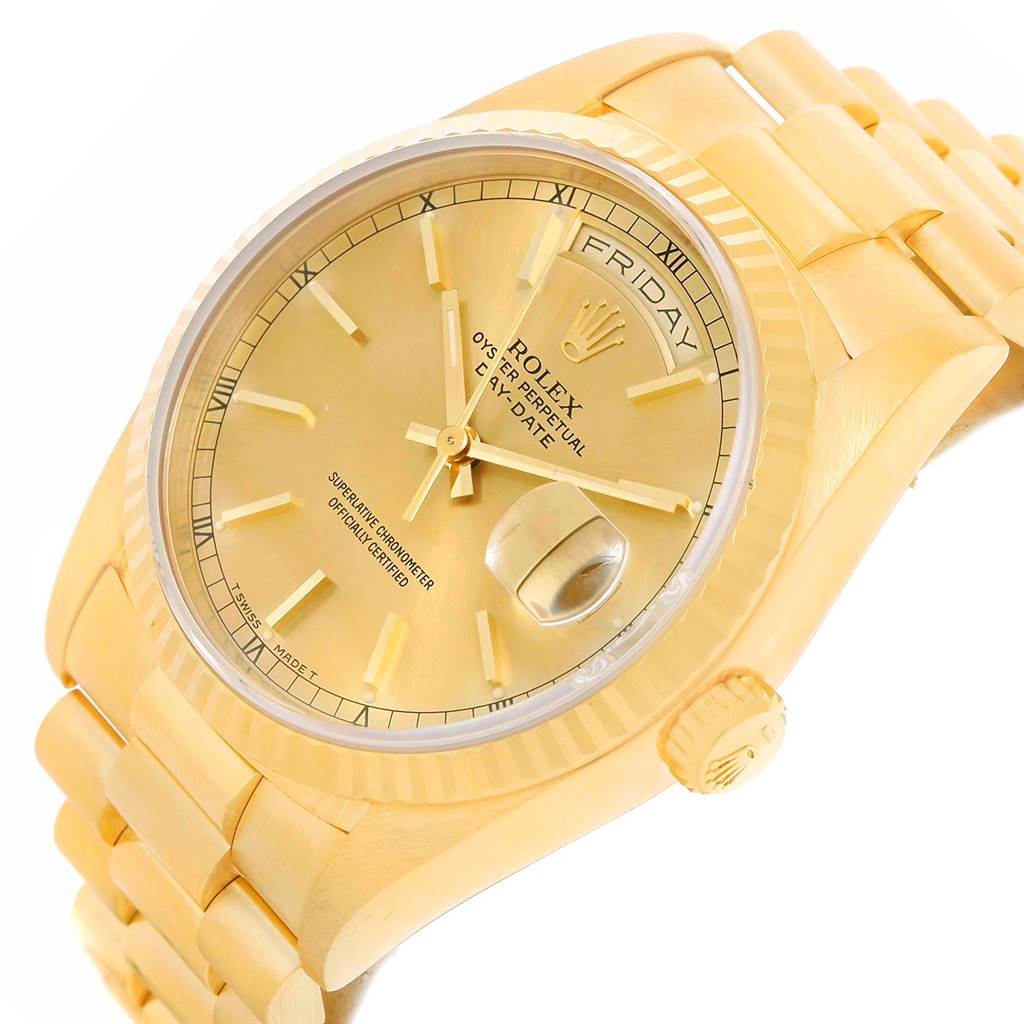 The image shows a close-up angle of a gold Rolex President 18238 Men
s Yellow Gold Champagne Dial 18238 Men
s Yellow Gold Champagne Dial watch, highlighting its face, bezel, and part of the band.