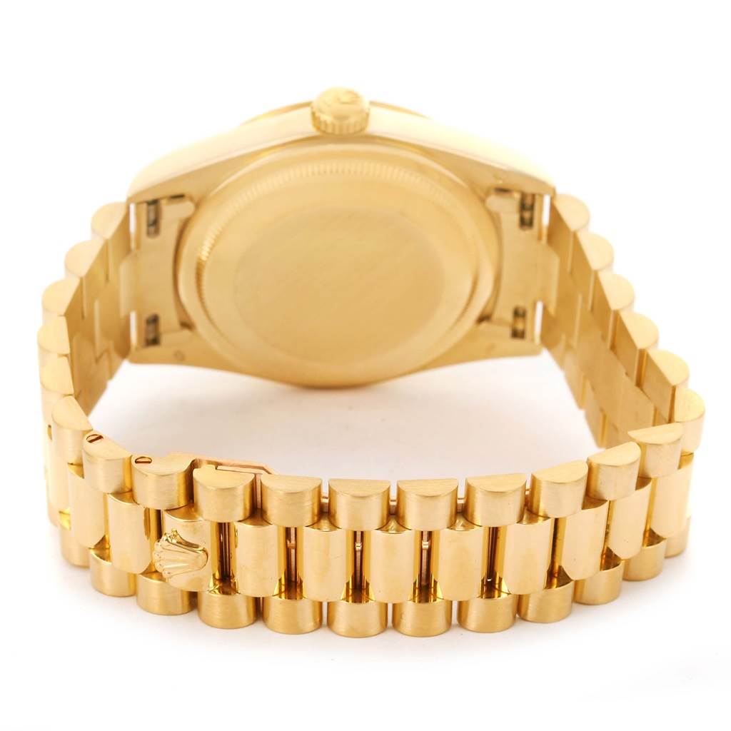 The image shows the back case and bracelet of a Rolex President 18238 Men
s Yellow Gold Champagne Dial 18238 Men
s Yellow Gold Champagne Dial model watch from a rear angle.