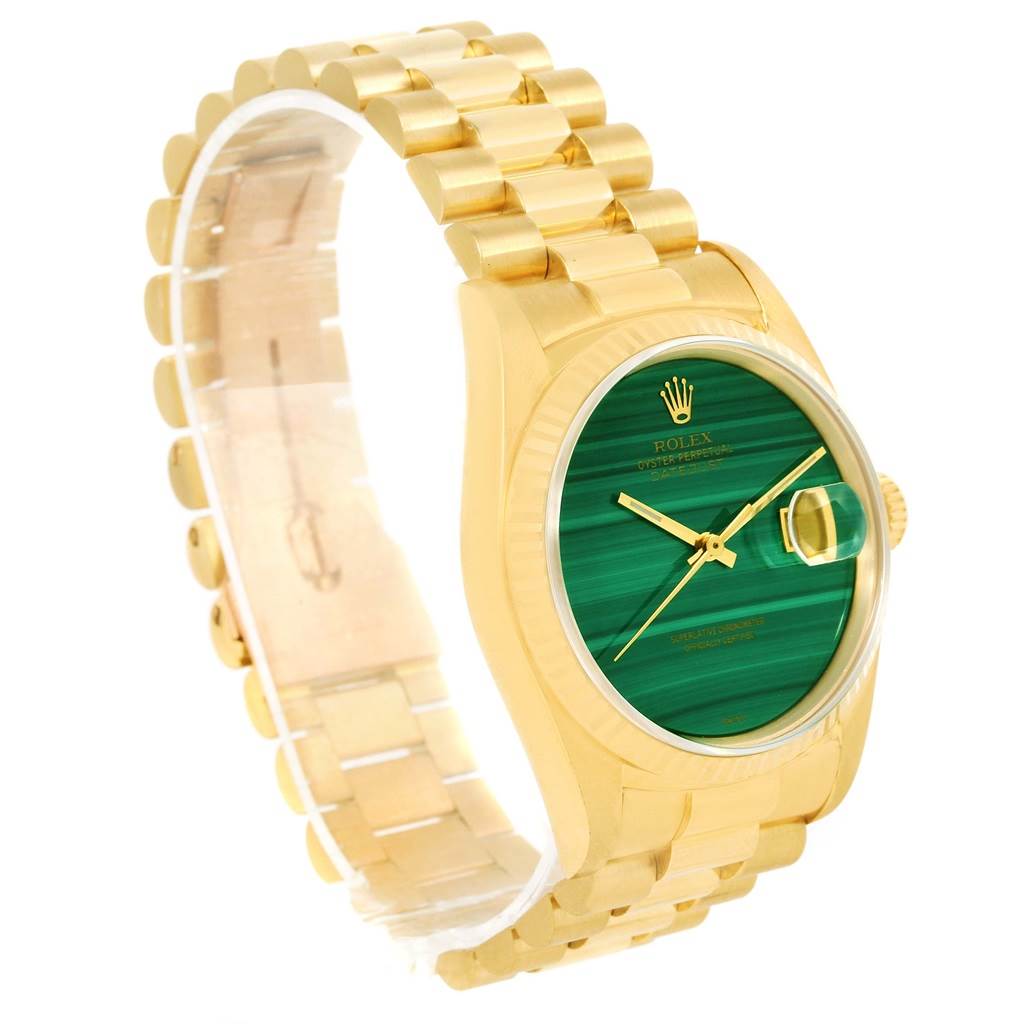 The Rolex President 16238 Men's Yellow Gold Green Dial 16238 Men's Yellow Gold Green Dial watch is shown at an angled side view, displaying the green dial, gold case, and bracelet.