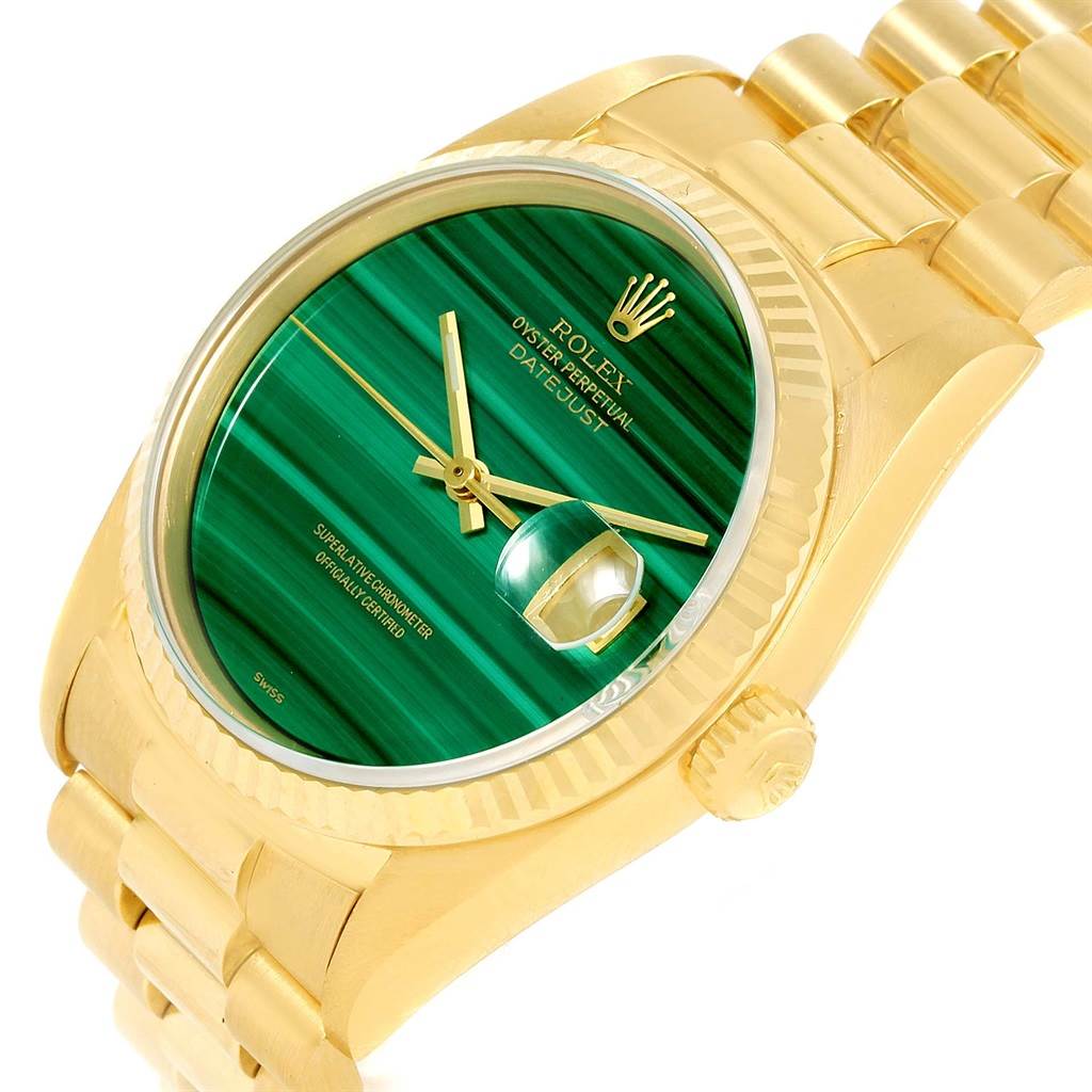 The image shows a Rolex President 16238 Men's Yellow Gold Green Dial 16238 Men's Yellow Gold Green Dial model watch from an angled top view, displaying its green dial, gold case, and bracelet.