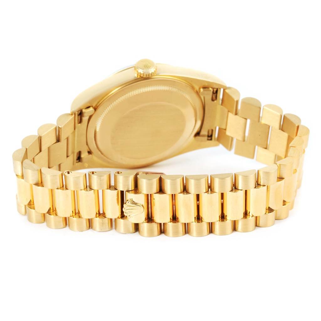 The image shows the case back and bracelet of a gold Rolex President 16238 Men's Yellow Gold Green Dial 16238 Men's Yellow Gold Green Dial model watch from a rear angle.