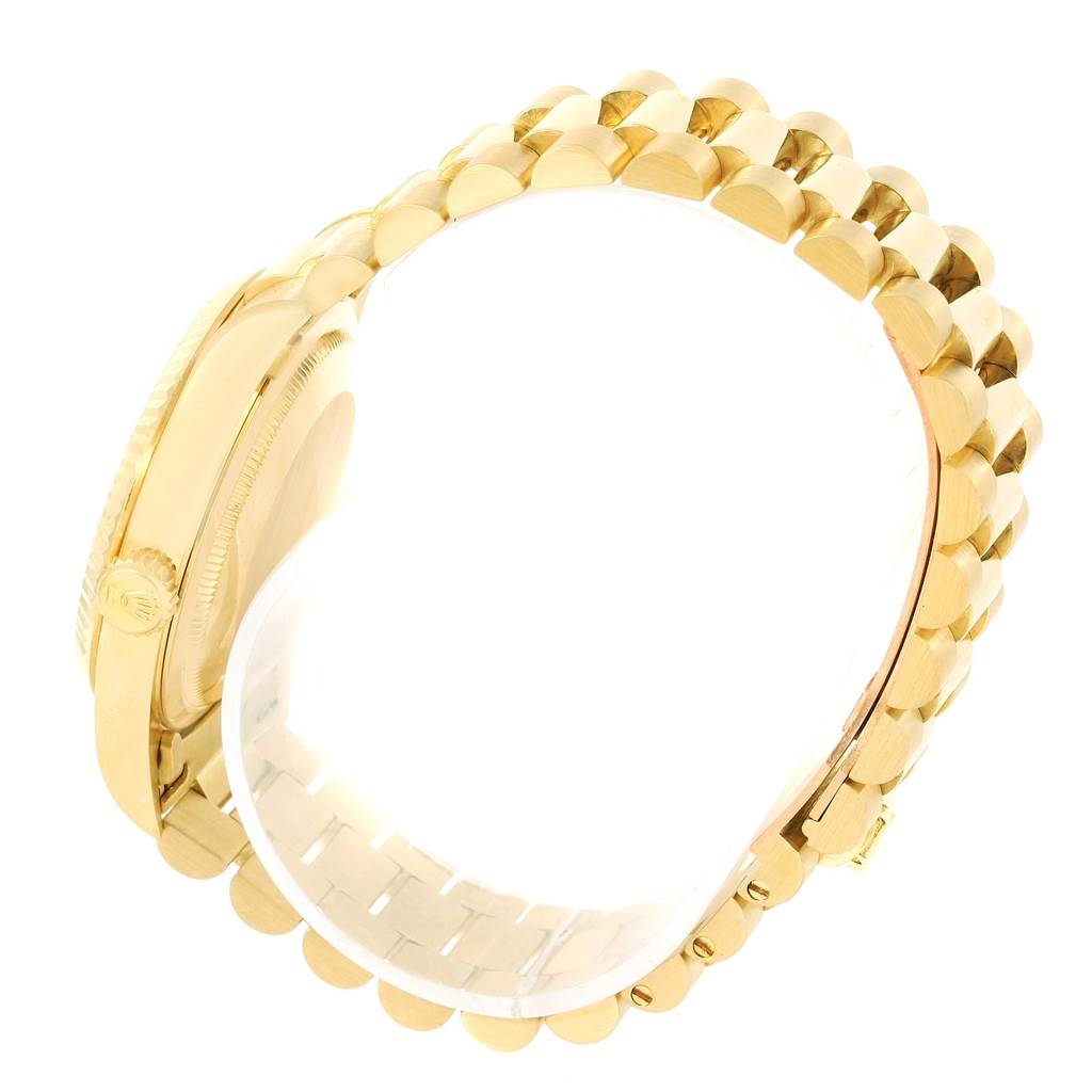 This image shows the side view of a Rolex President 16238 Men's Yellow Gold Green Dial 16238 Men's Yellow Gold Green Dial model watch, highlighting the case and the gold bracelet.