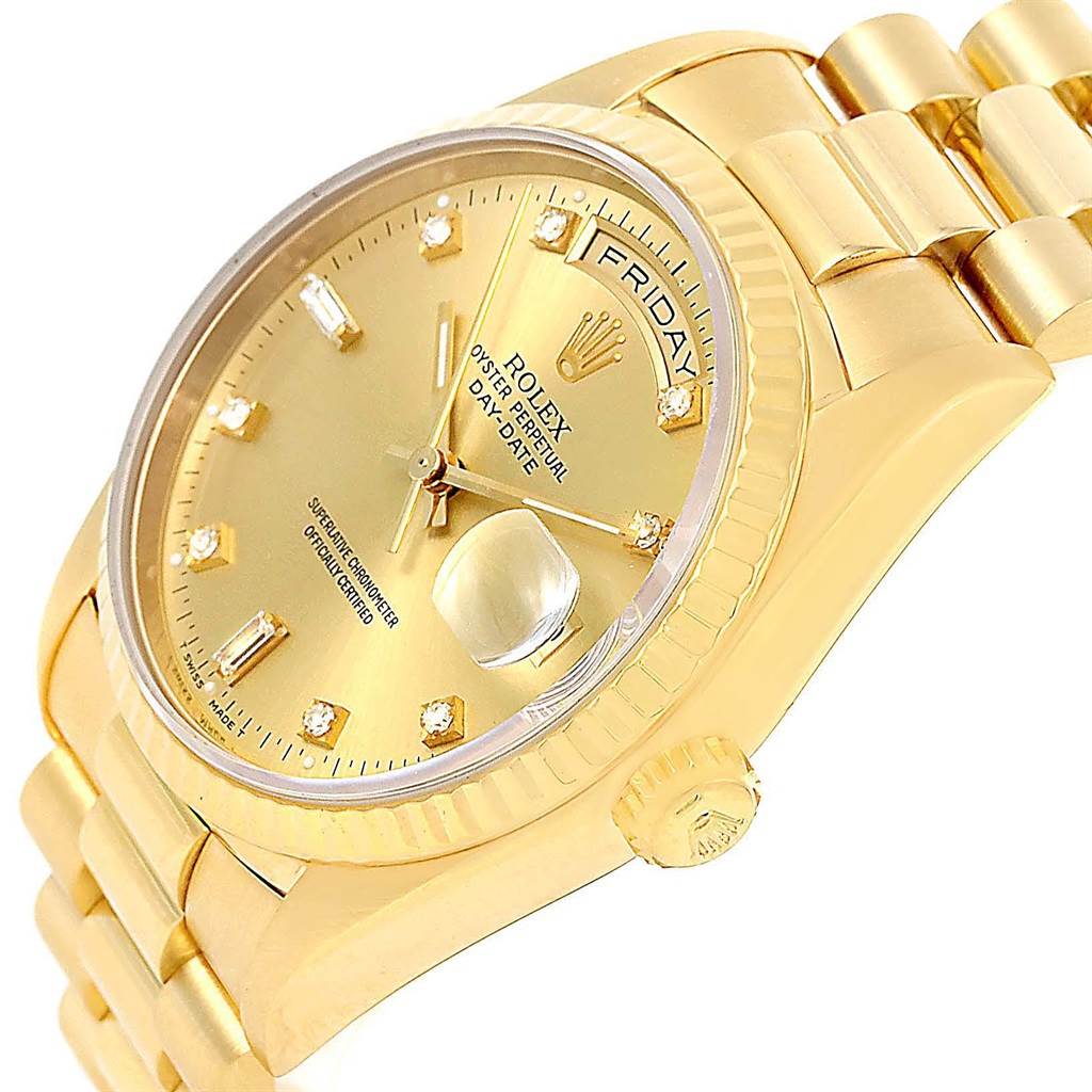 This image shows an angled view of a Rolex President 18238 Men
s Yellow Gold Champagne Dial 18238 Men
s Yellow Gold Champagne Dial model, highlighting its gold dial, bracelet, fluted bezel, and crown.