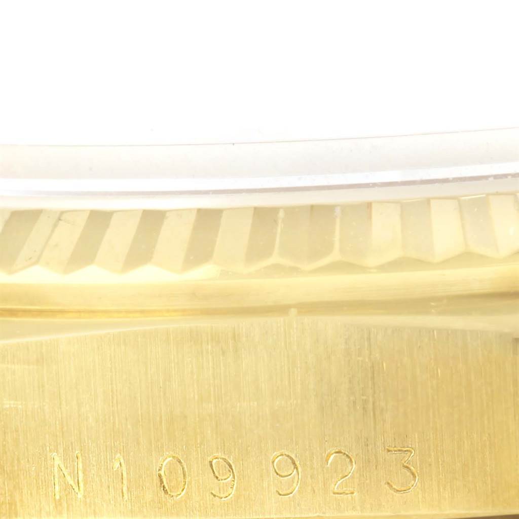 This image shows the serial number engraved on the side of a Rolex President 18238 Men
s Yellow Gold Champagne Dial 18238 Men
s Yellow Gold Champagne Dial watch case.