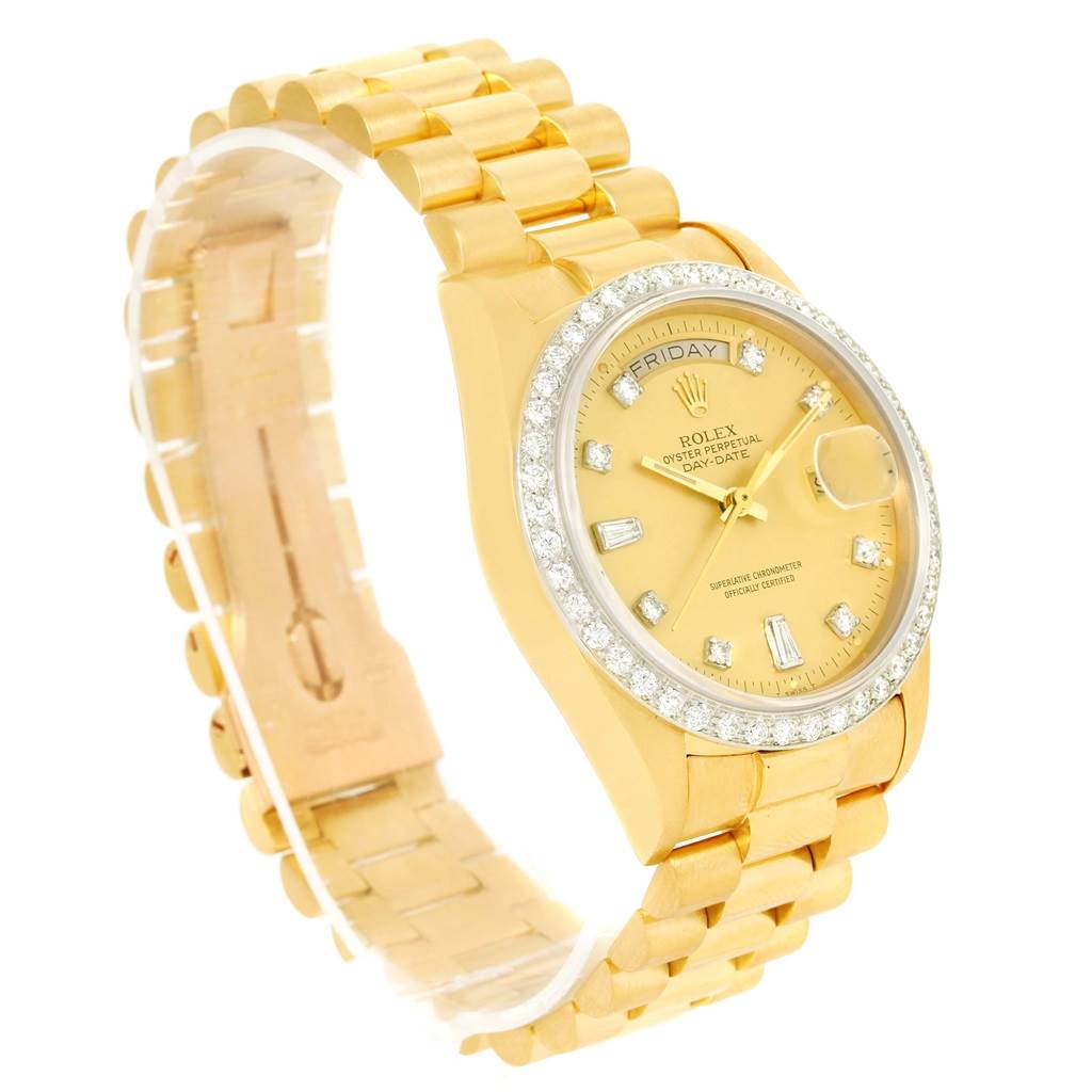 The image shows a Rolex President 18048 Men
s Yellow Gold Champagne Dial 18048 Men
s Yellow Gold Champagne Dial model watch at an angled view, highlighting its gold bracelet, diamond bezel, and face with date indicators.