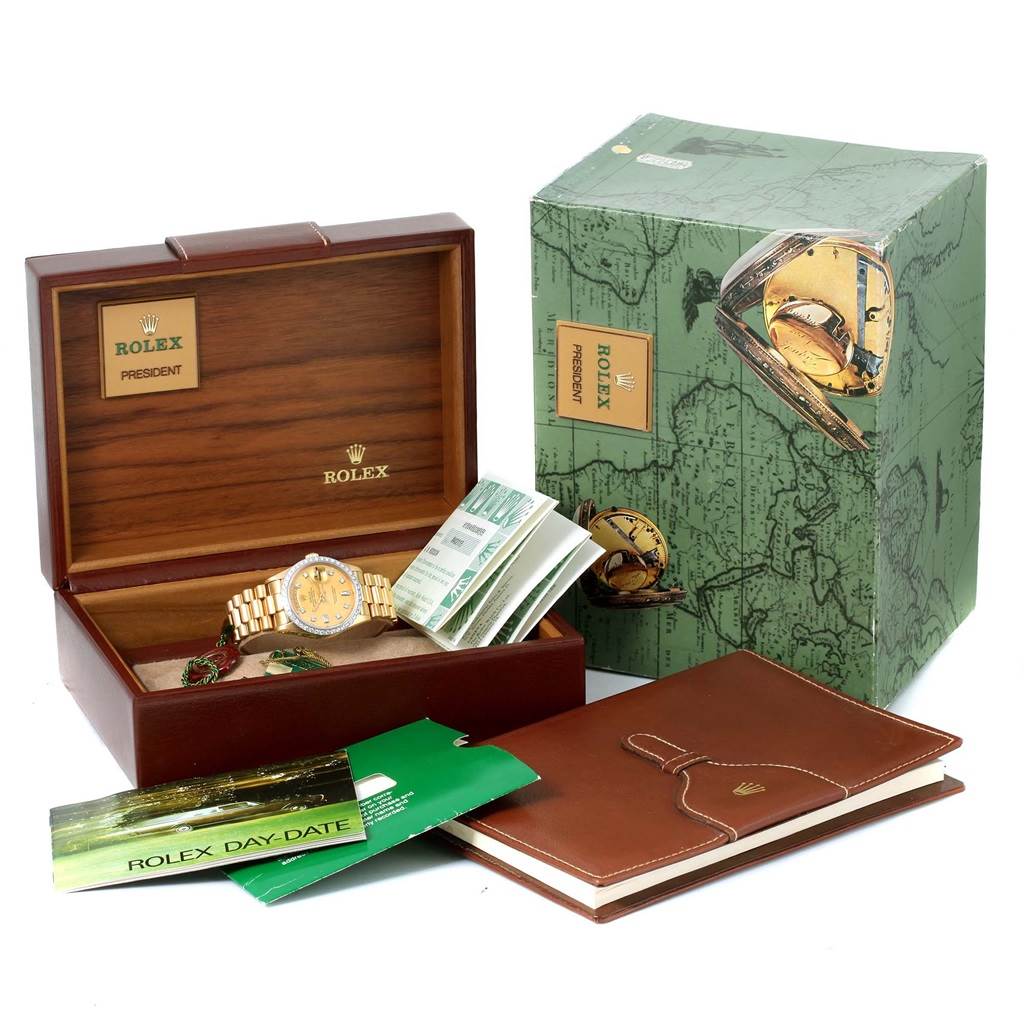 The image shows a Rolex President 18048 Men
s Yellow Gold Champagne Dial 18048 Men
s Yellow Gold Champagne Dial model watch in a wooden box, with manuals, tags, and original outer packaging.