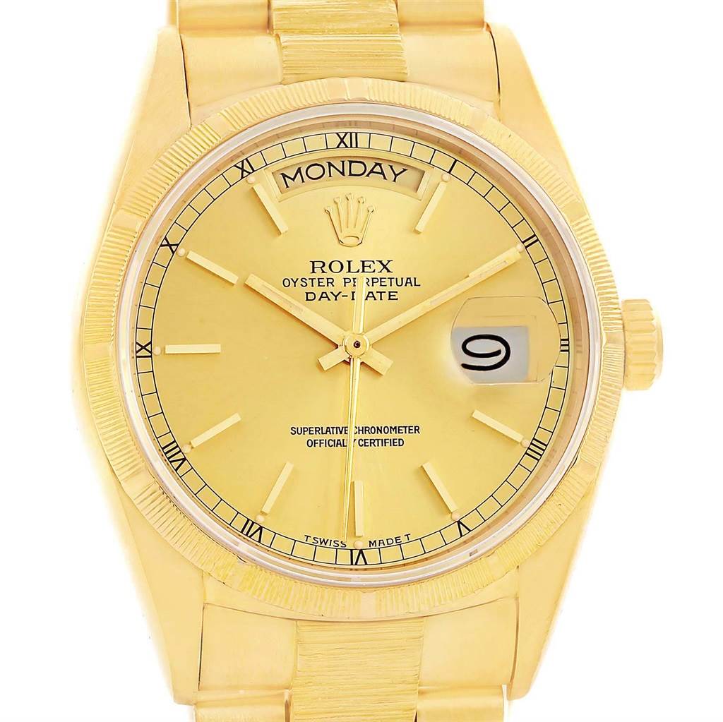 This image shows a frontal view of a Rolex President 18078 Men
s Yellow Gold Champagne Dial 18078 Men
s Yellow Gold Champagne Dial model watch, highlighting the dial, day and date indicators, and part of the bracelet.
