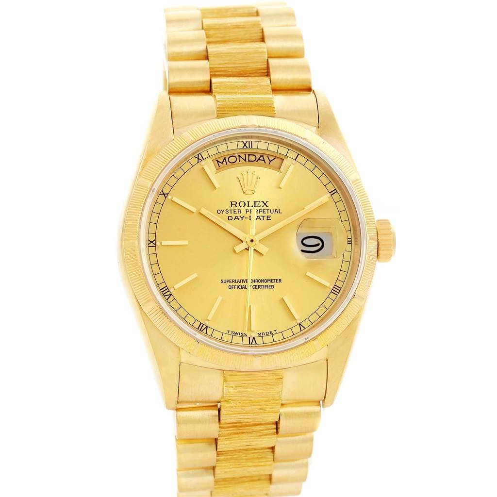 The Rolex President 18078 Men
s Yellow Gold Champagne Dial 18078 Men
s Yellow Gold Champagne Dial model watch is shown from a straight-on angle featuring the face, dial, day, and date displays, and bracelet.