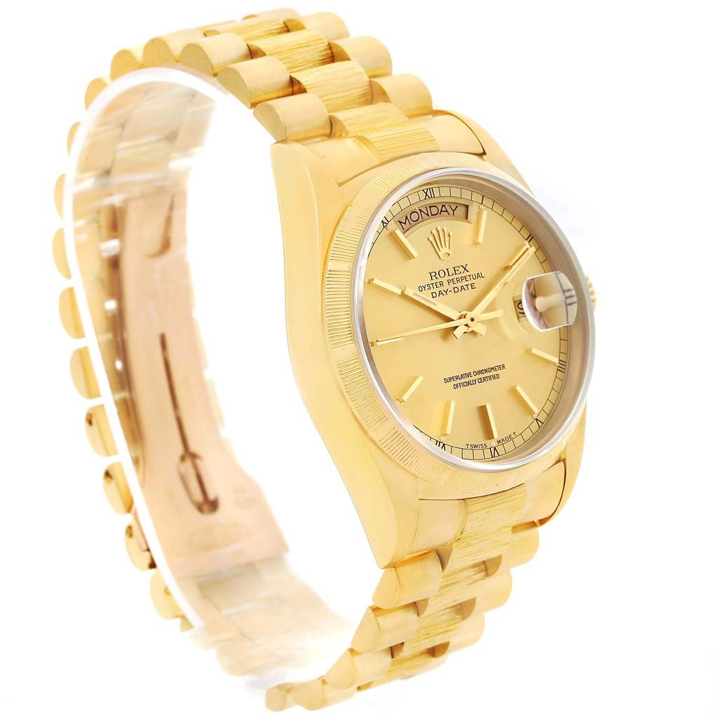 The image shows a Rolex President 18078 Men
s Yellow Gold Champagne Dial 18078 Men
s Yellow Gold Champagne Dial model watch at a slight angle, highlighting its gold bracelet, bezel, and dial with a day-date feature.