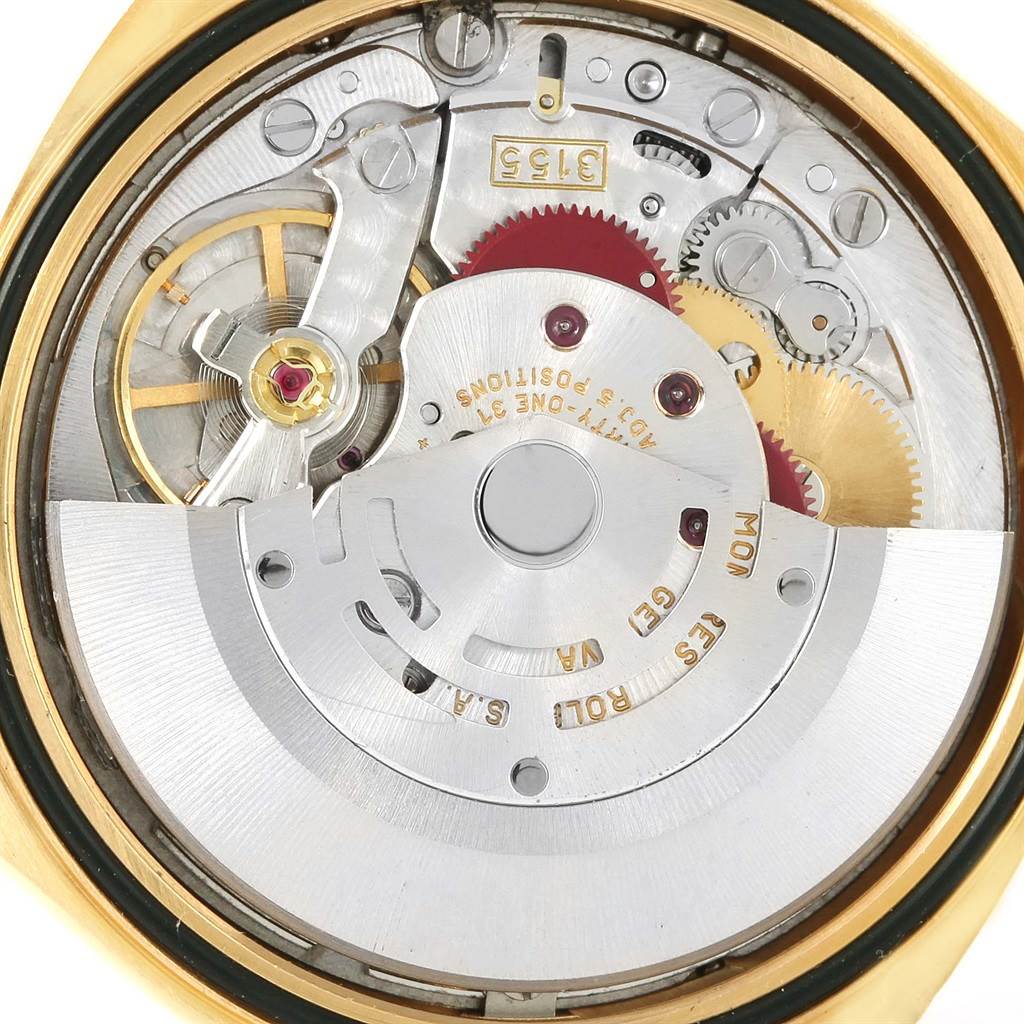 The image shows the internal mechanical movement of a Rolex President 18238 Men
s Yellow Gold Champagne Dial 18238 Men
s Yellow Gold Champagne Dial model watch.