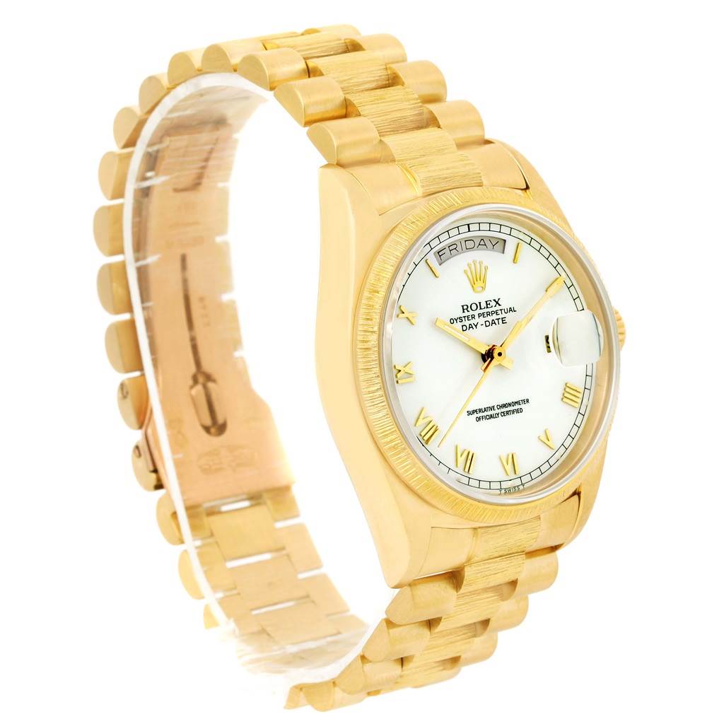 The image shows a Rolex President 18078 Men
s Yellow Gold White Dial 18078 Men
s Yellow Gold White Dial model watch at a slight angle, highlighting its gold bracelet and white dial with day-date features.