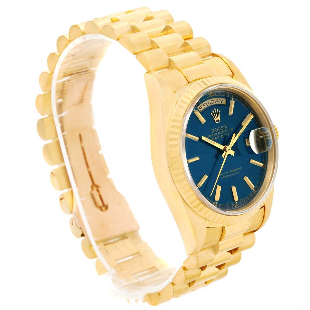The image shows a Rolex President 18238 Men's Yellow Gold Blue Dial 18238 Men's Yellow Gold Blue Dial model watch at an angled view, highlighting its gold bracelet and blue dial.