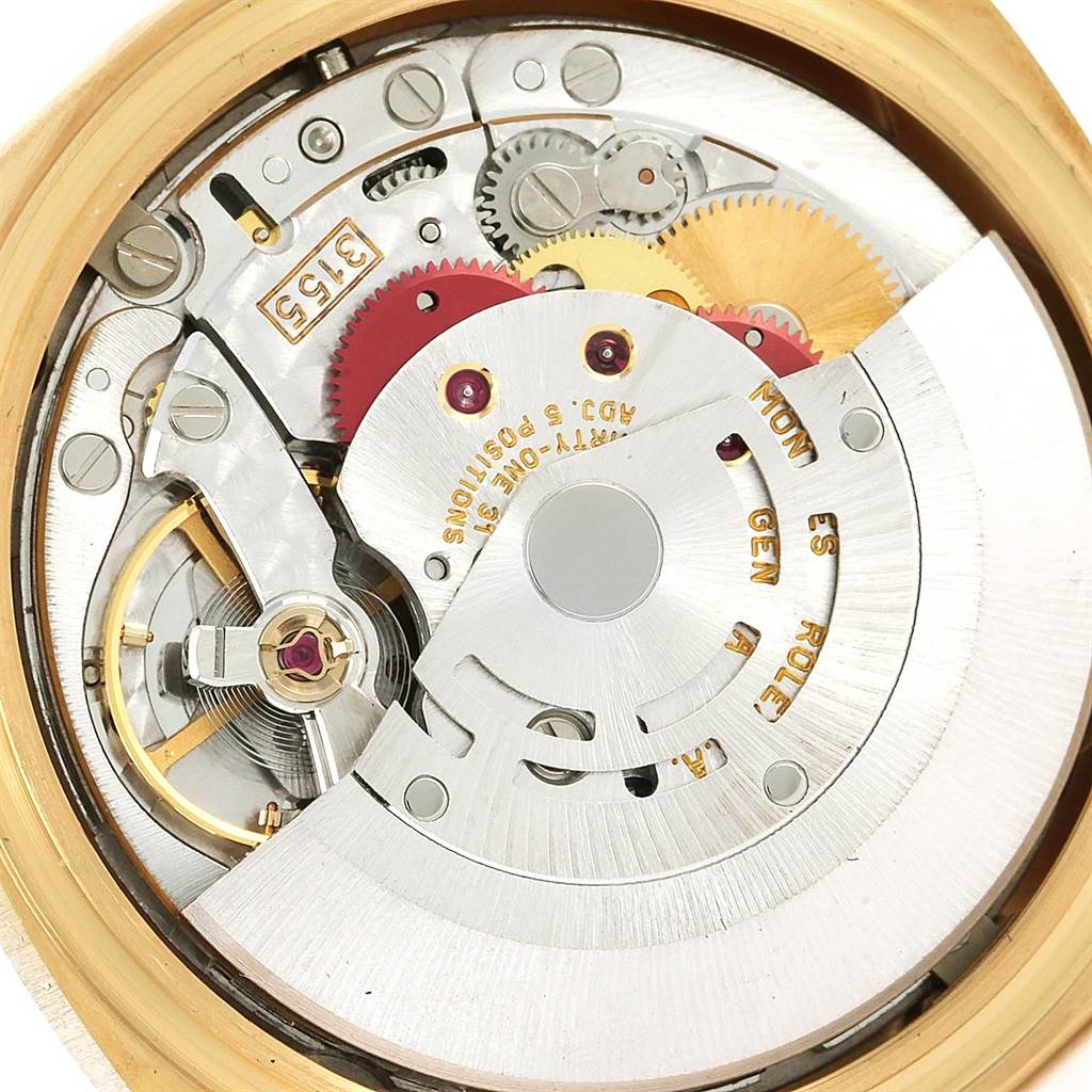 The image shows an up-close view of the internal movement mechanism of a Rolex President 18238 Men's Yellow Gold Blue Dial 18238 Men's Yellow Gold Blue Dial model watch.
