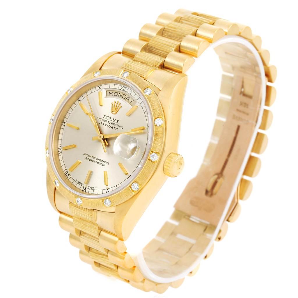 The image shows a Rolex President 18078 Men
s Yellow Gold Silver Dial 18078 Men
s Yellow Gold Silver Dial watch at an oblique angle, displaying the face, bezel, crown, and polished bracelet.