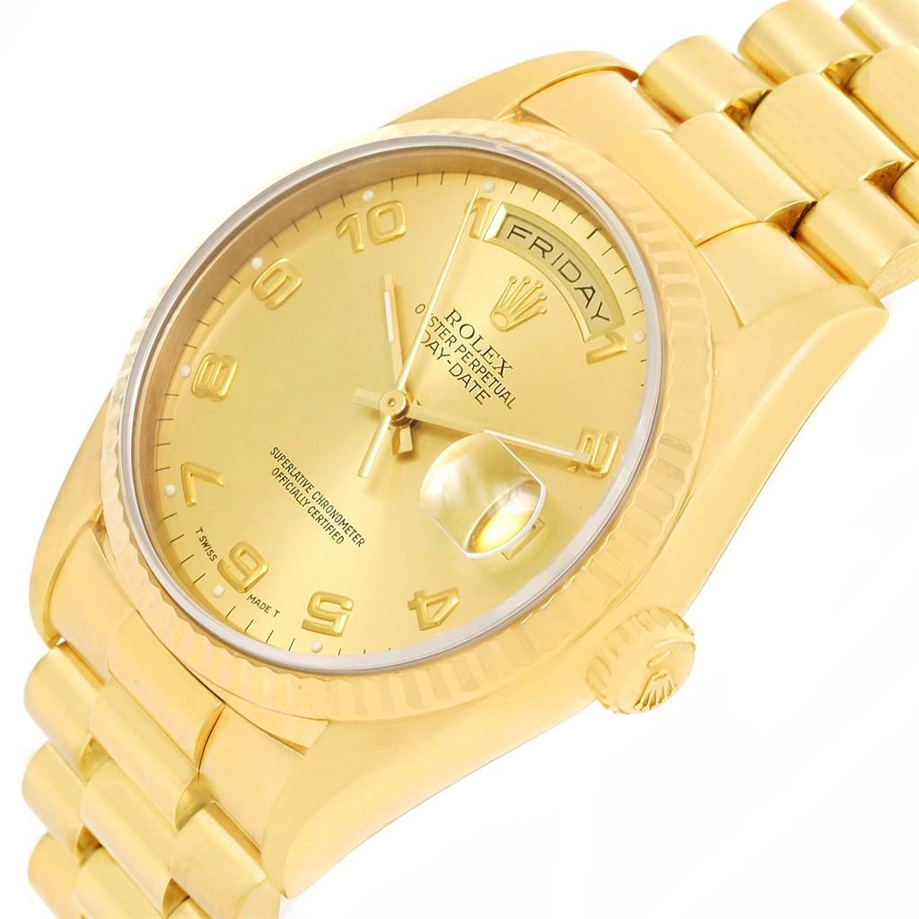 The image shows a Rolex President 18238 Men
s Yellow Gold Champagne Dial 18238 Men
s Yellow Gold Champagne Dial model watch at a slight angle, highlighting the gold dial, bracelet, crown, and day-date display.