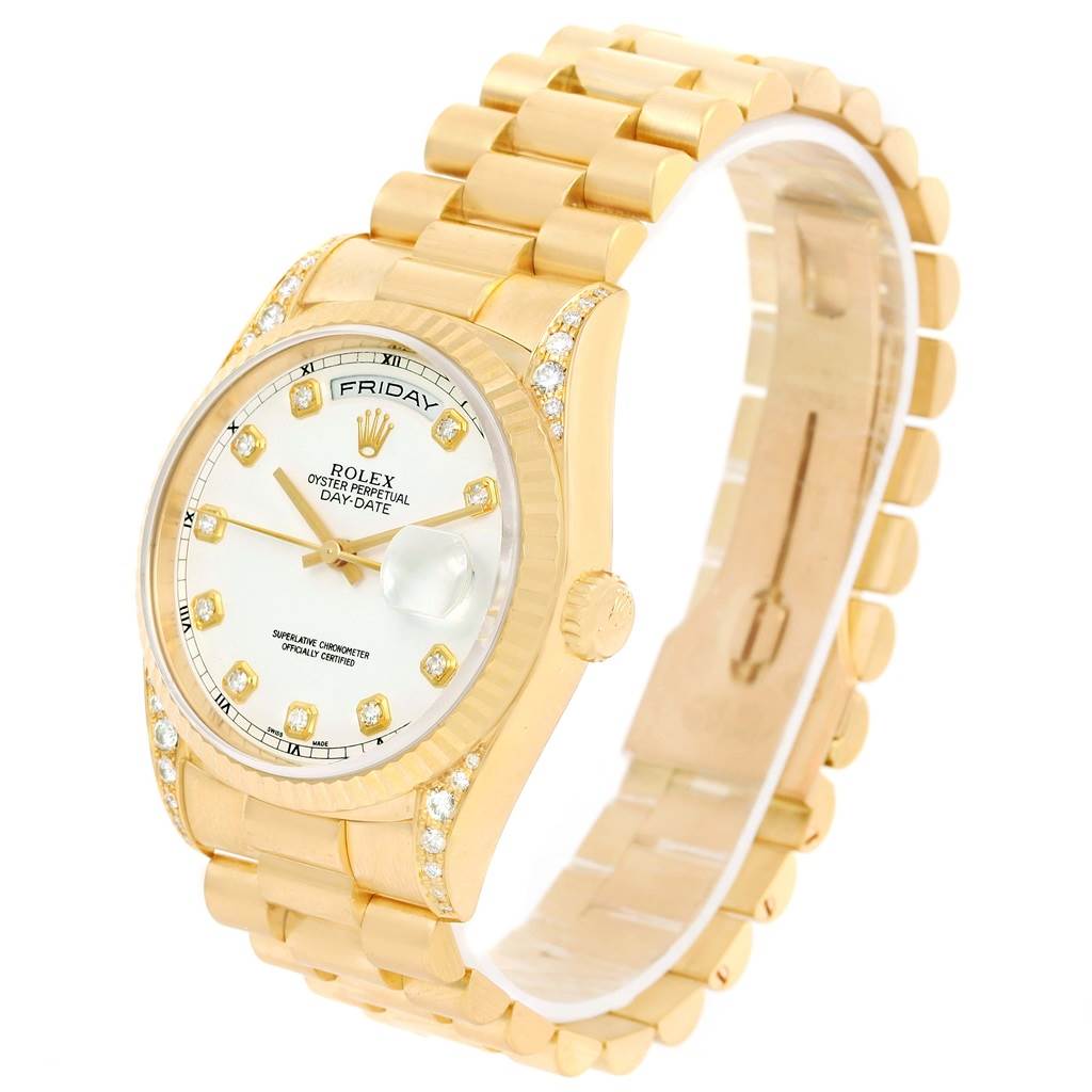 The image shows a Rolex President 18338 Men's Yellow Gold White Dial 18338 Men's Yellow Gold White Dial model watch, featuring a gold bracelet, bezel, and crown viewed from an angled front perspective.