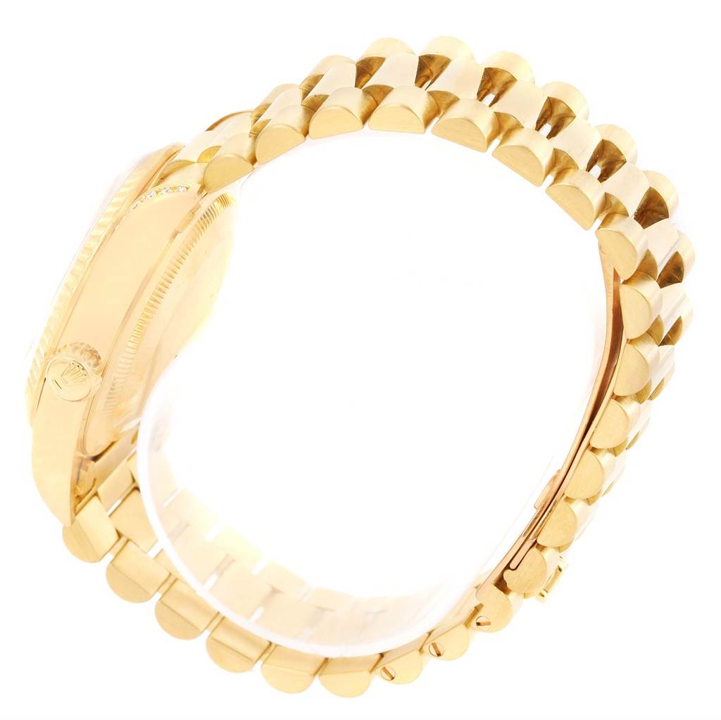 The image shows a side view of a Rolex President 18338 Men's Yellow Gold White Dial 18338 Men's Yellow Gold White Dial model, focusing on the gold link bracelet and watch case.