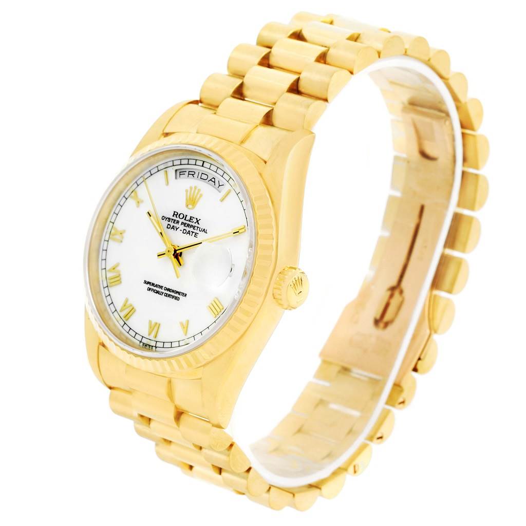 The Rolex President 18238 Men's Yellow Gold White Dial 18238 Men's Yellow Gold White Dial model watch is shown at an angle displaying its face, bezel, crown, and part of the bracelet.