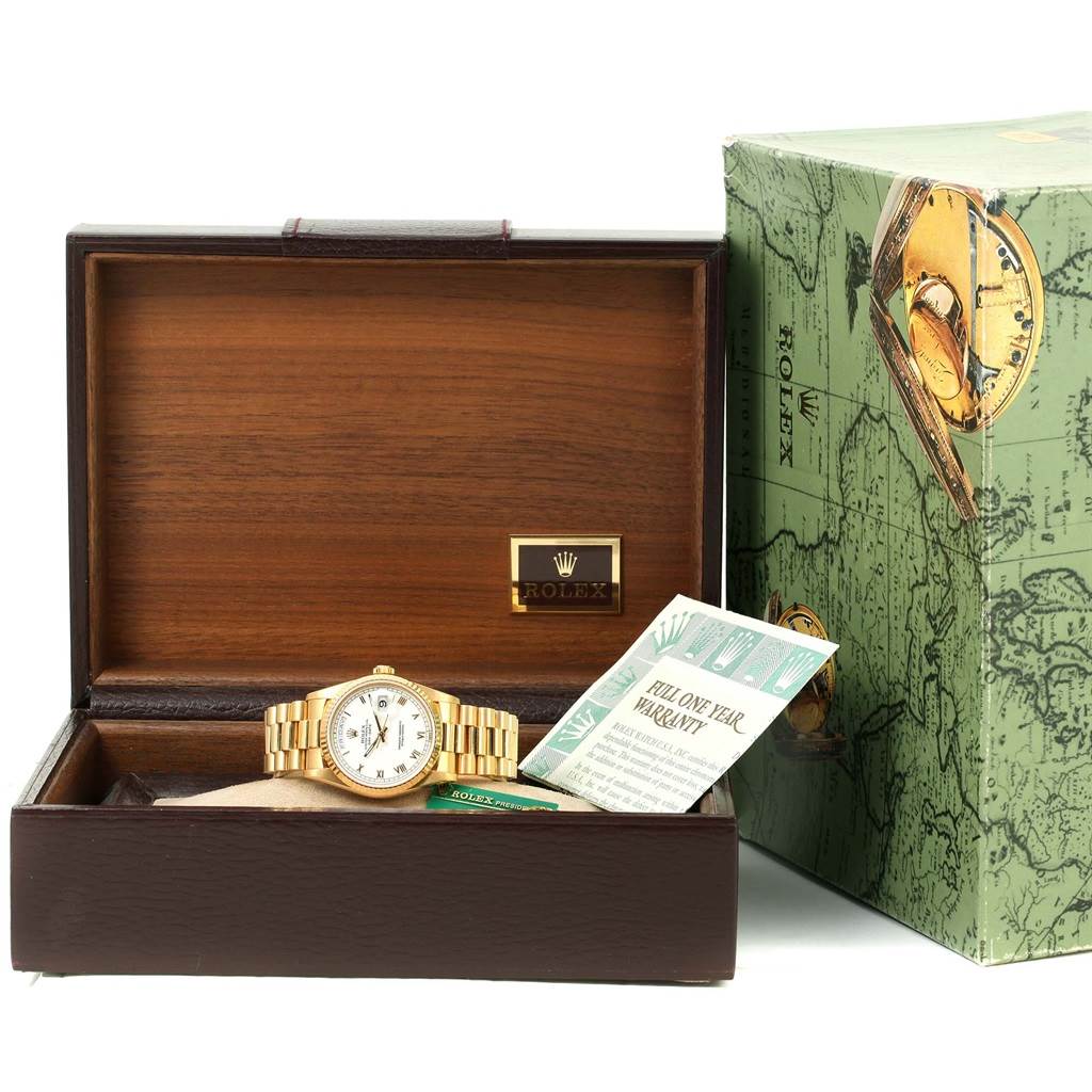 The Rolex President 18238 Men's Yellow Gold White Dial 18238 Men's Yellow Gold White Dial model is shown from the front inside a wooden box with warranty papers and an outer decorative box.