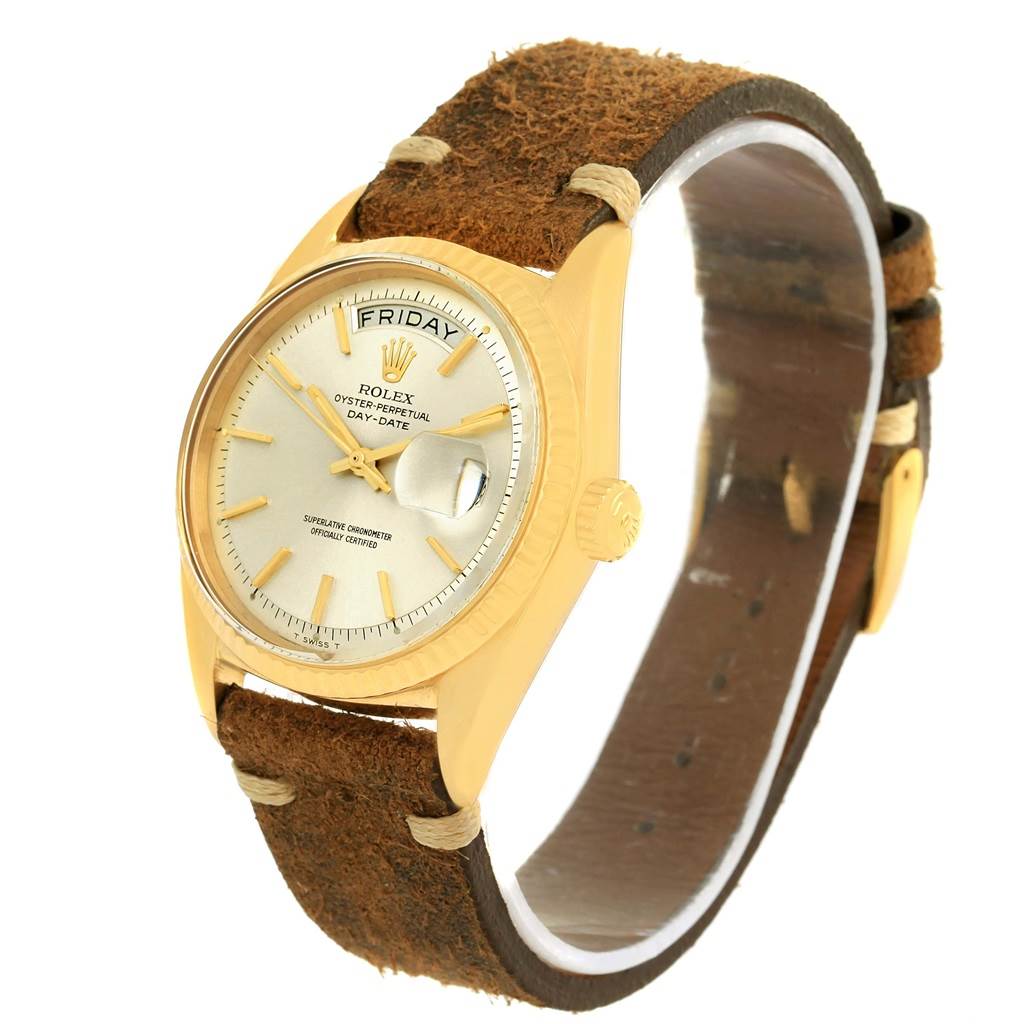 This image shows a Rolex President 1803 Men's Yellow Gold Silver Dial 1803 Men's Yellow Gold Silver Dial model watch at a three-quarter angle, highlighting the face and the leather strap.