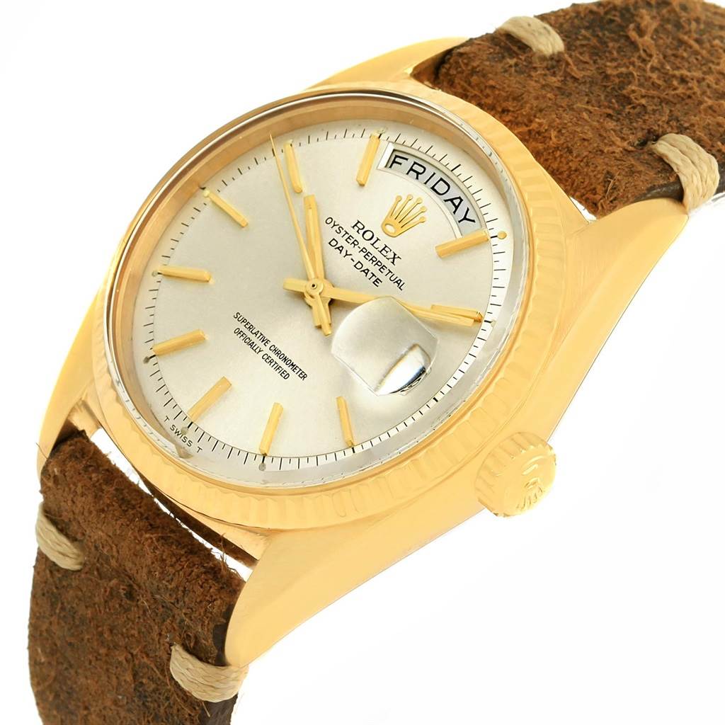 This image shows a close-up angle of the Rolex President 1803 Men's Yellow Gold Silver Dial 1803 Men's Yellow Gold Silver Dial model, highlighting its dial, day-date display, and crown.