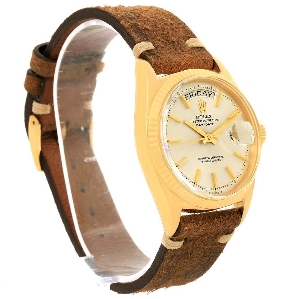 The image shows a Rolex President 1803 Men's Yellow Gold Silver Dial 1803 Men's Yellow Gold Silver Dial model watch at a three-quarter angle, featuring its face, crown, and leather strap.