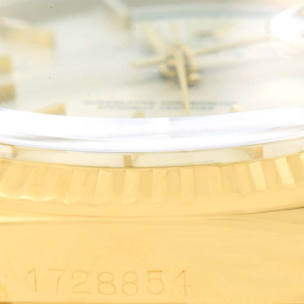 This image shows a close-up of the side view of a Rolex President 1803 Men's Yellow Gold Silver Dial 1803 Men's Yellow Gold Silver Dial model's case and its serial number.