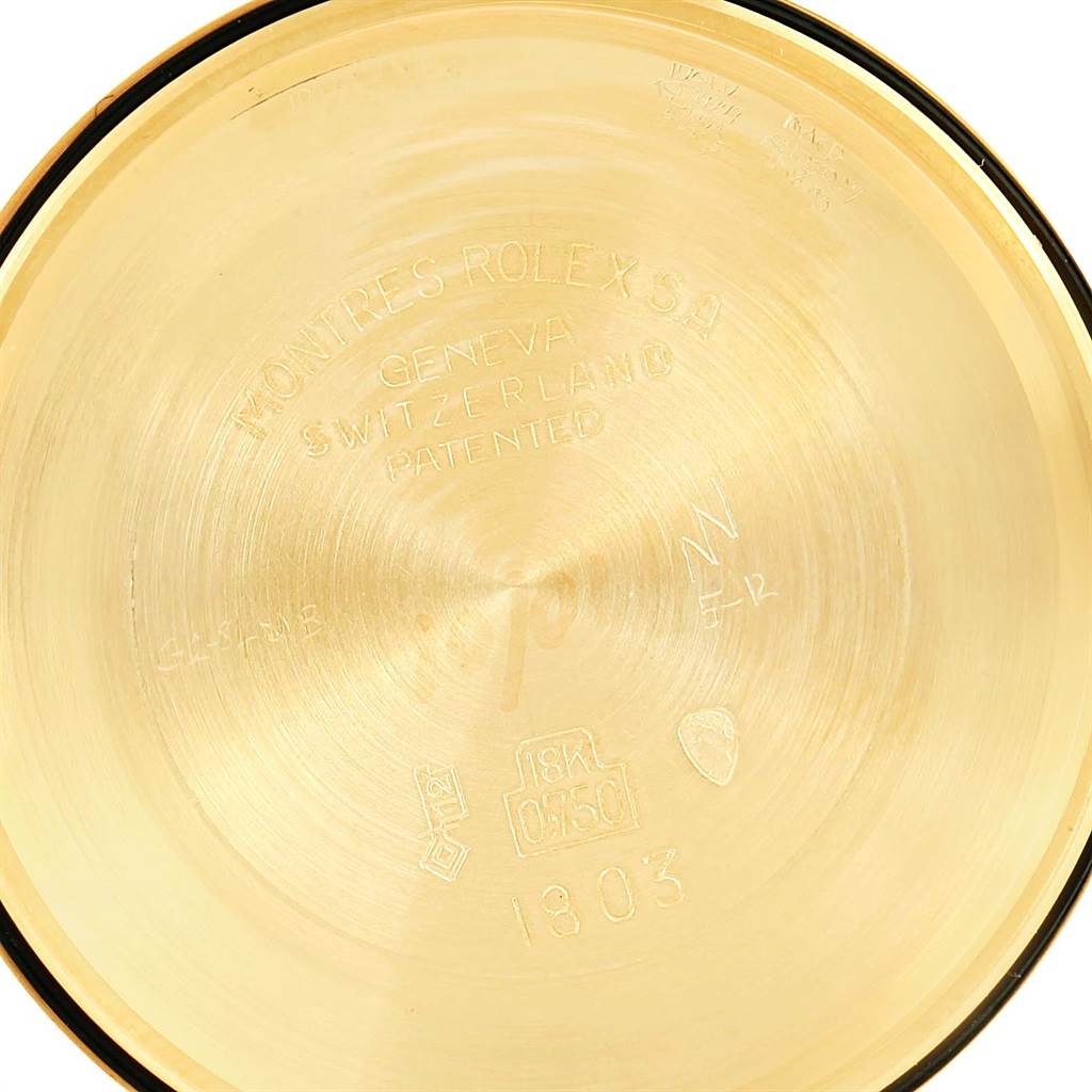 The image shows the inner case back of a Rolex President 1803 Men's Yellow Gold Silver Dial 1803 Men's Yellow Gold Silver Dial model watch, displaying engraved text and hallmarks.
