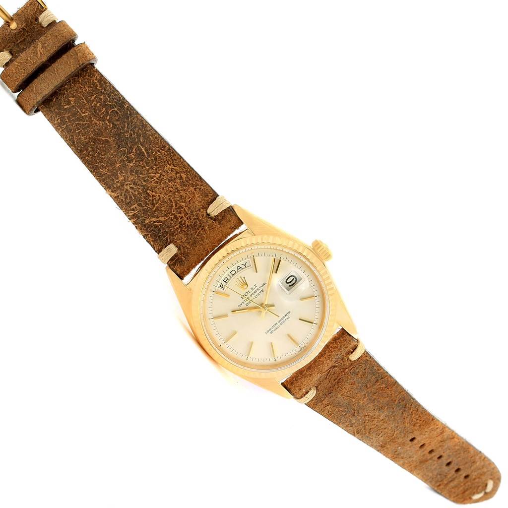 The image shows a Rolex President 1803 Men's Yellow Gold Silver Dial 1803 Men's Yellow Gold Silver Dial model watch angled slightly to display both the face and leather strap.