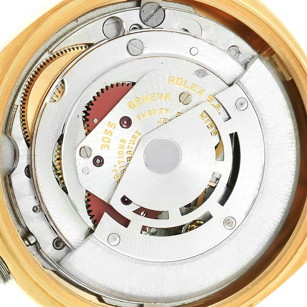 This image shows the internal movement mechanism of the Rolex President 18038 Men
s Yellow Gold Blue Dial 18038 Men
s Yellow Gold Blue Dial watch model from a close-up top angle.