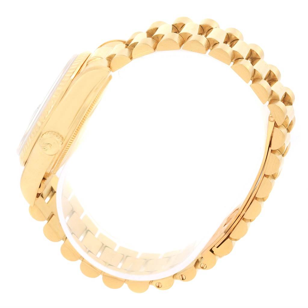 The image shows a side view of a Rolex President 18038 Men
s Yellow Gold Blue Dial 18038 Men
s Yellow Gold Blue Dial model watch, highlighting the case, crown, and bracelet.