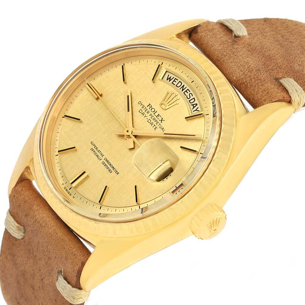 This image shows a close-up angle of a Rolex President 1803 Men
s Yellow Gold Champagne Dial 1803 Men
s Yellow Gold Champagne Dial watch displaying the dial, case, day, and date windows.