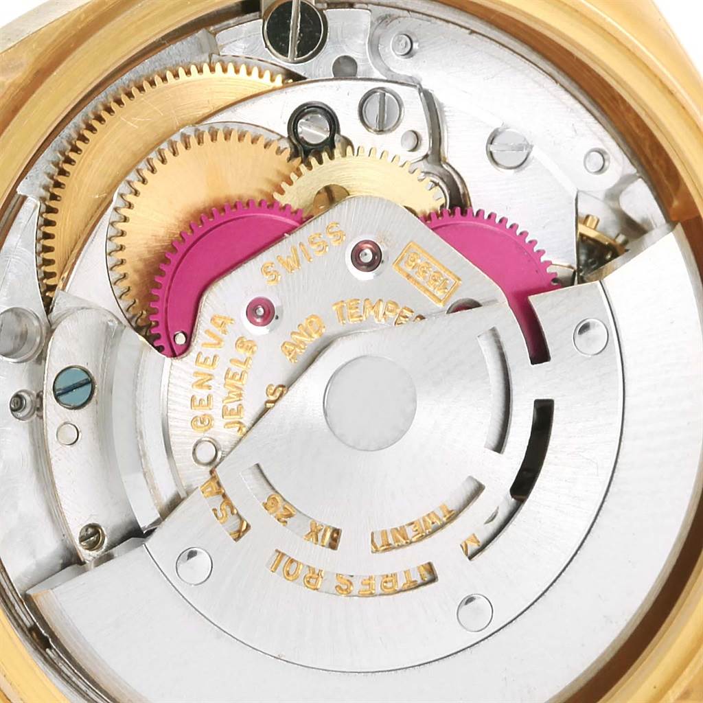 This close-up image shows the intricate internal mechanisms of a Rolex President 1803 Men
s Yellow Gold Champagne Dial 1803 Men
s Yellow Gold Champagne Dial model watch.