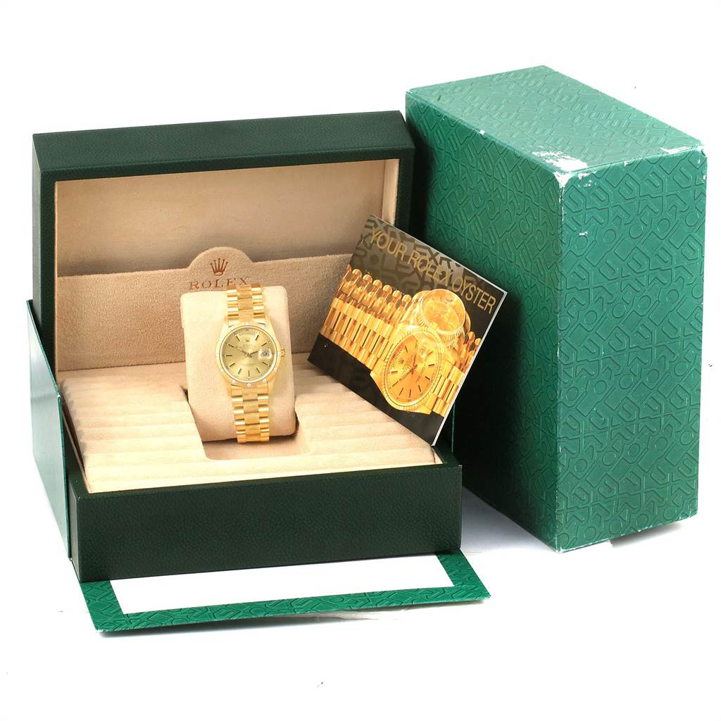The image shows a Rolex President 18308 Men's Yellow Gold Champagne Dial 18308 Men's Yellow Gold Champagne Dial model watch in its open green box with an information card beside it.