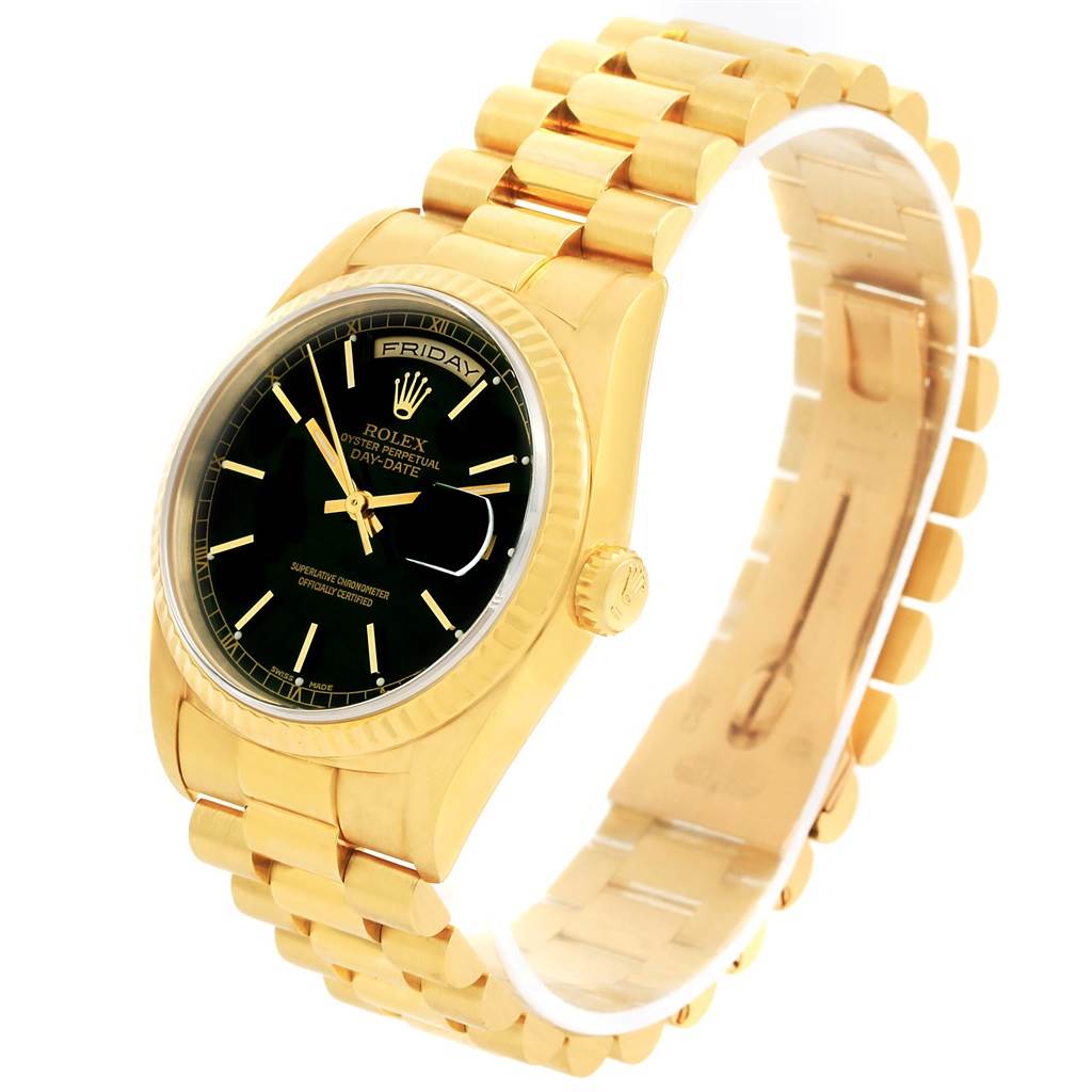 The image shows a side angle of the Rolex President 18238 Men
s Yellow Gold Black Dial 18238 Men
s Yellow Gold Black Dial model watch, highlighting its black dial, gold case, and bracelet.