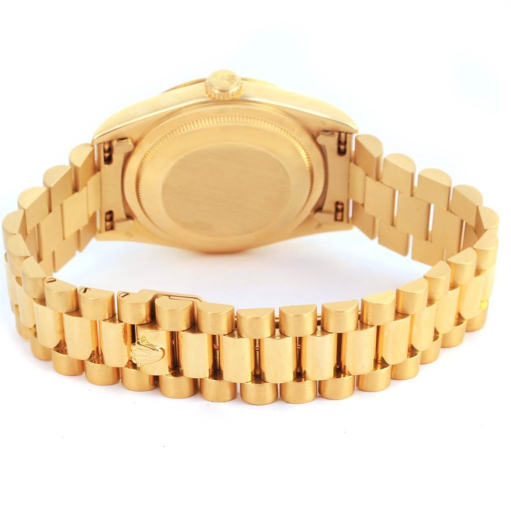 This image shows the back case and bracelet of a Rolex President 18238 Men
s Yellow Gold Black Dial 18238 Men
s Yellow Gold Black Dial model watch, viewed from the rear angle.