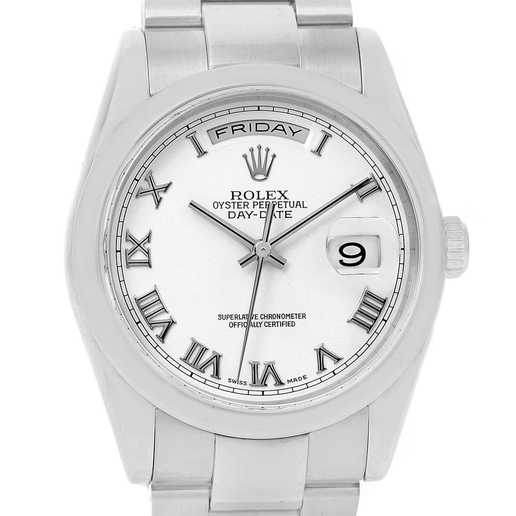 The image shows the face and part of the bracelet of a Rolex President 118209 Men's White Gold White Dial 118209 Men's White Gold White Dial model watch, directly from the front.