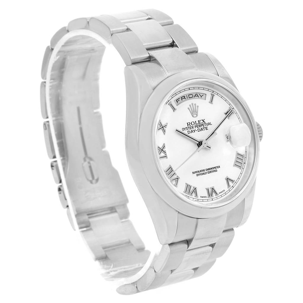 The image shows a Rolex President 118209 Men's White Gold White Dial 118209 Men's White Gold White Dial model watch featuring the face, bezel, and partially open bracelet from an angled view.